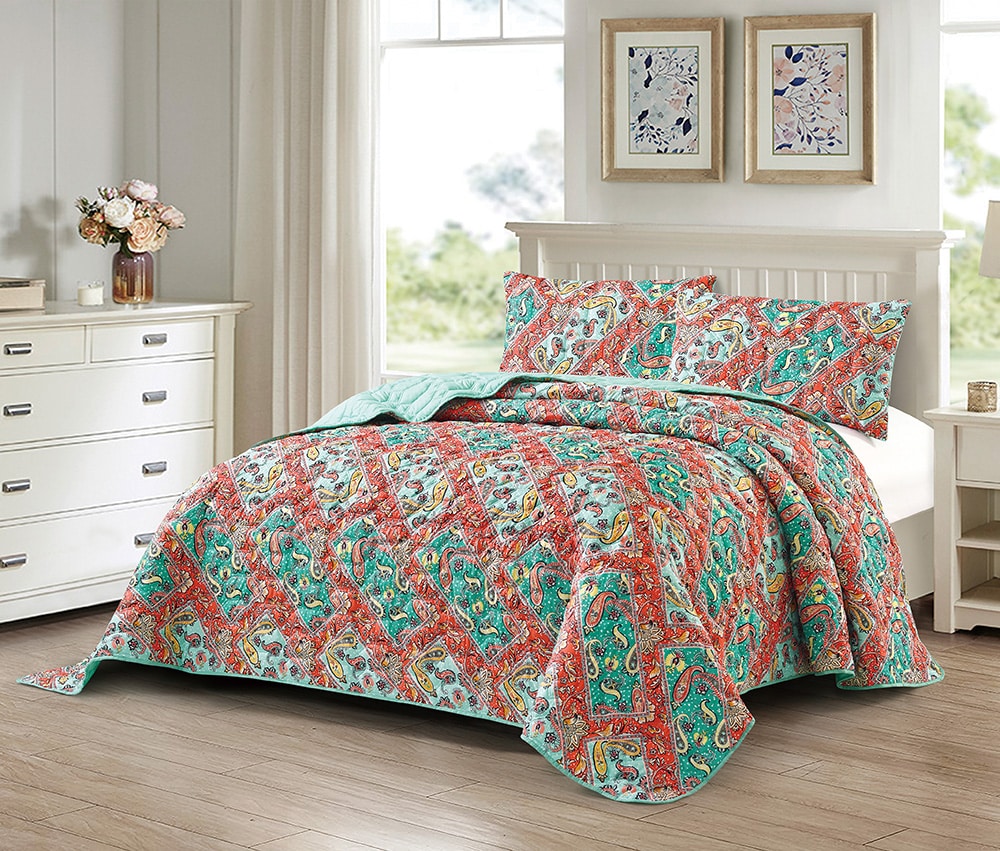 colourful bedspread on a double bed from Living Emporium