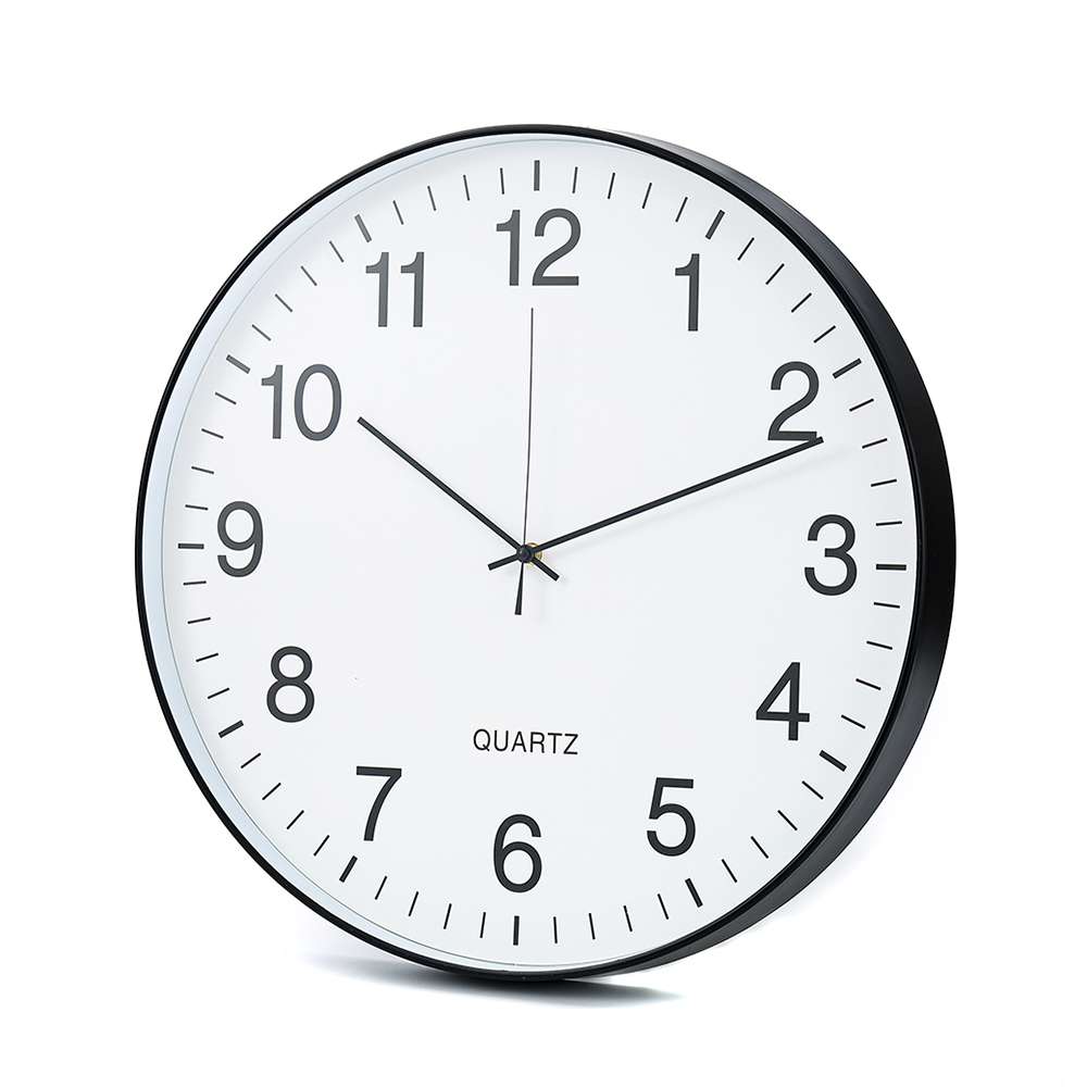 Simple black and white wall clock with numbers.