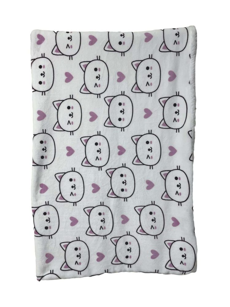 Soft blanket with cartoon cat faces and hearts.