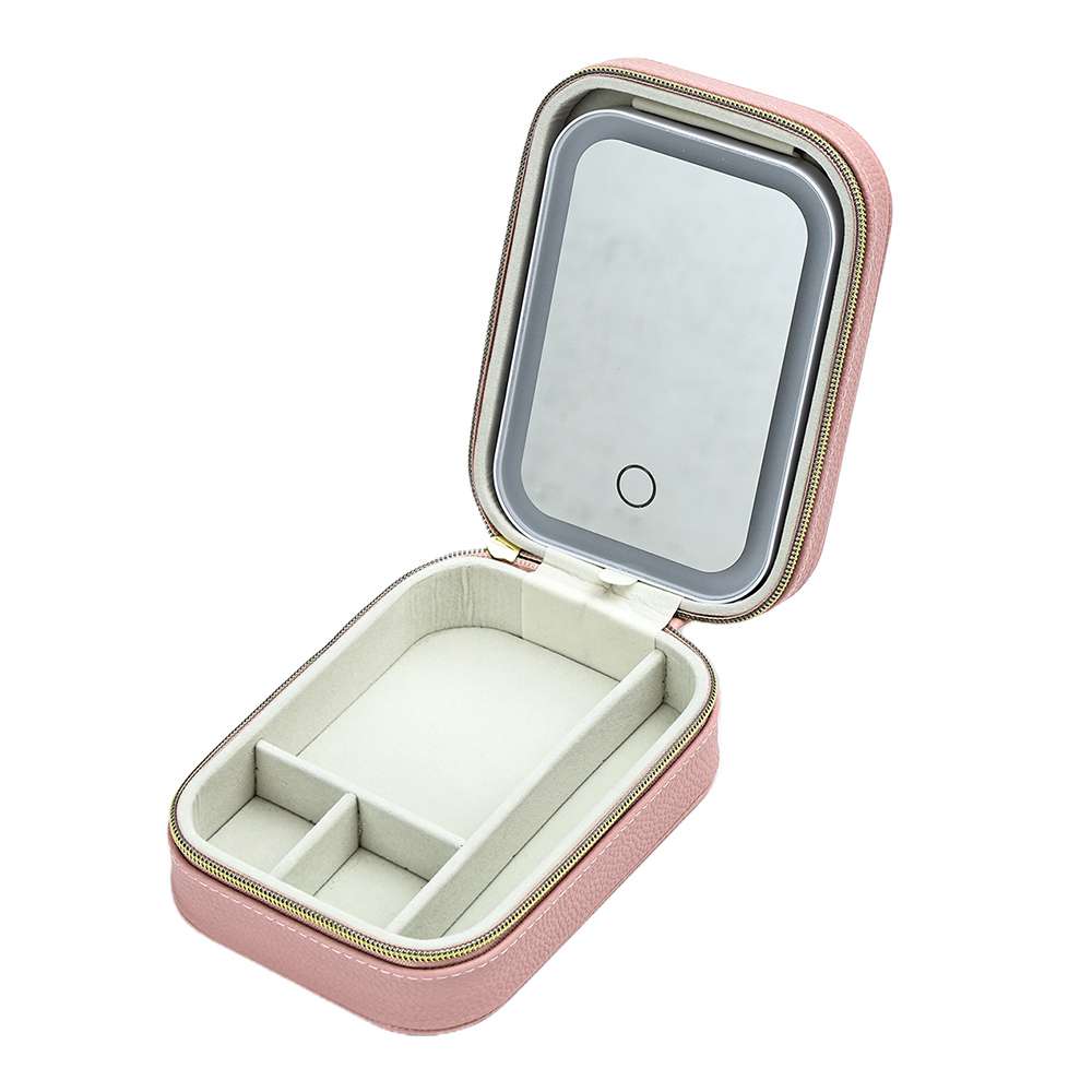 Open jewelry case with mirror and compartments