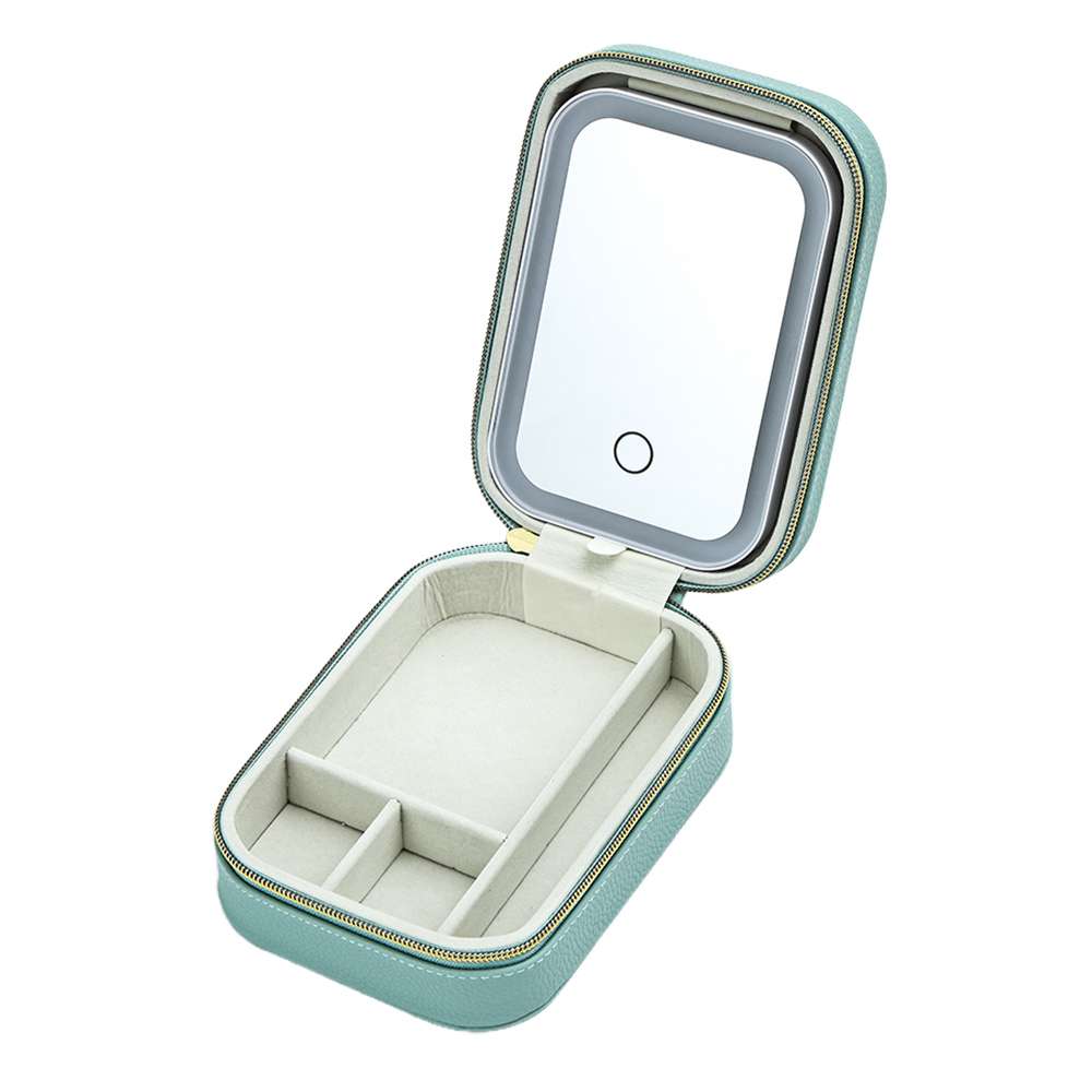 Open jewelry case with compartments and mirror