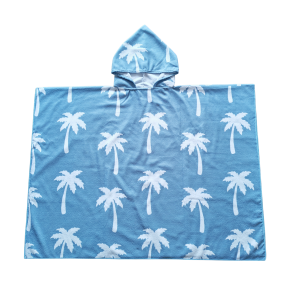 Blue hooded poncho with white palm tree pattern